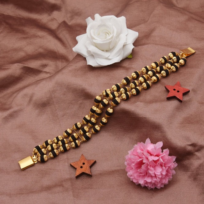 Attention-Getting Design 3 Line Gold Plated Rudraksha Bracelet for Men - Style B773 - AmazingBaba