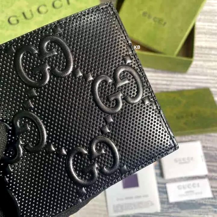 GUCCI GG ENGRAVED Bi-FOLD WALLET